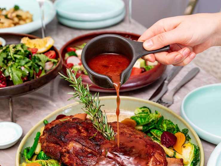 A plated roast dinner photographed on a restaurant table
